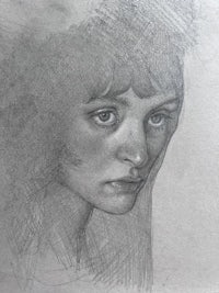 a pencil drawing of a woman's face